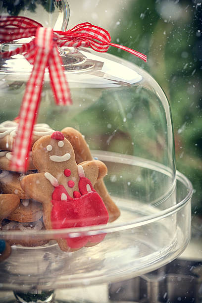 istock Christmas Gingerbread cookie  on glass stand with snow flakes 622549130