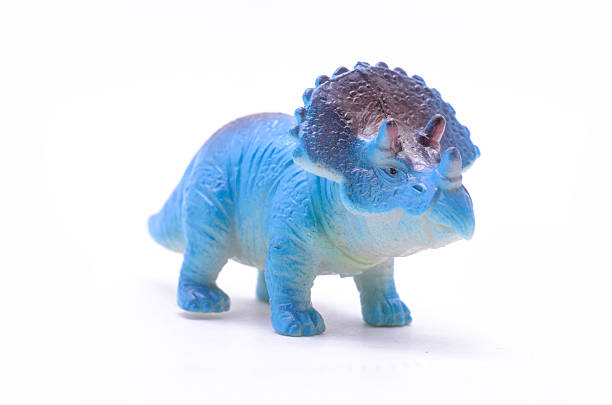 istock Triceratops dinosaur toy isolated on white 622549380