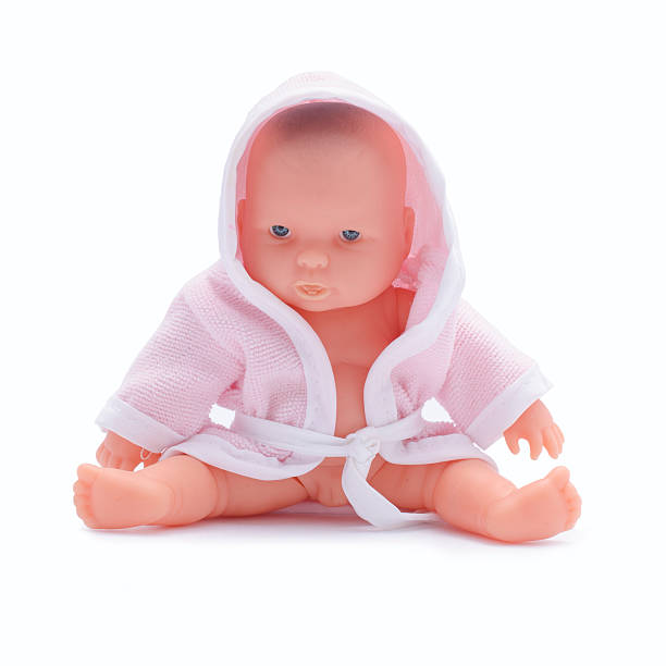 istock baby doll  isolated on white 622767364