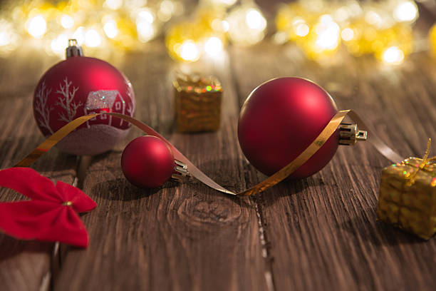 istock Christmas balls on wooden table 622767476