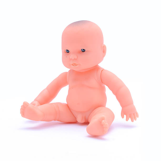 istock baby doll  isolated on white 622767484