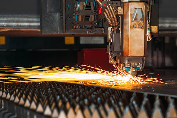 istock Laser cutting machine cuts the metal with sparks 622767974
