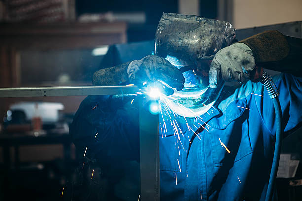 istock sparks while welder uses torch to welding 622769114