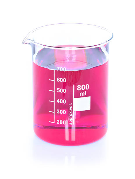 istock Chemical beaker with red chemicals dissolved in water 622770746