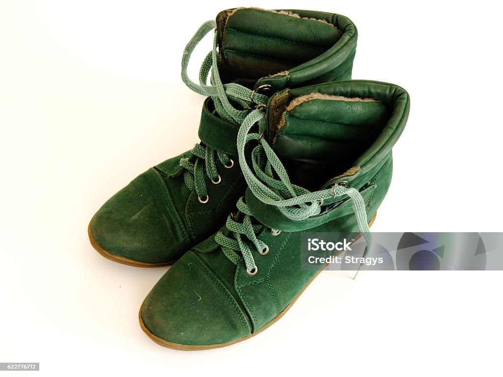 Winter Shoes Green Women's Winter Shoes in white Background Adult Stock Photo