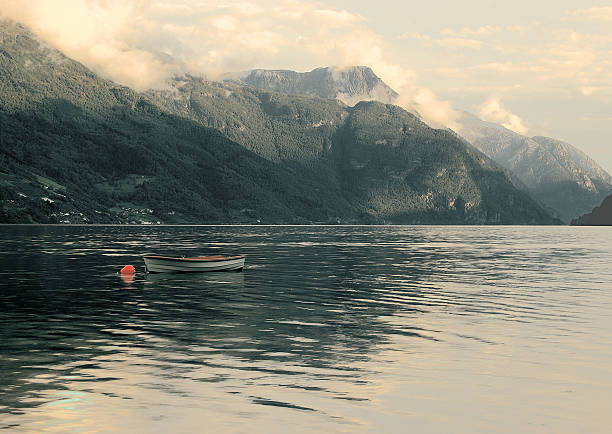 istock Boat on fjord 622779158