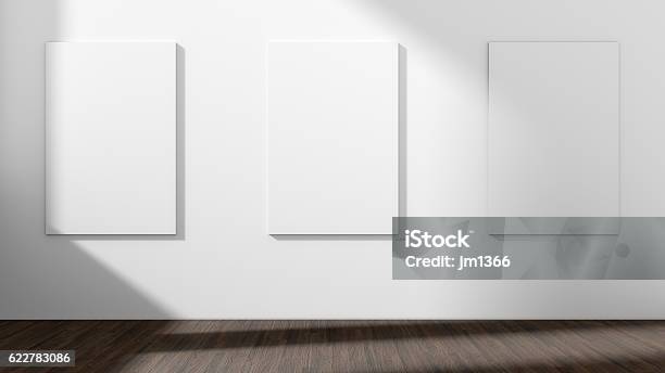 White Empty Room With Empty Three Frame3d Rendering Stock Photo - Download Image Now