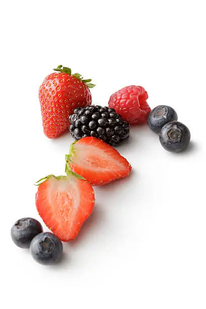 Photo of Fruit: Strawberry, Raspberry, Blueberry and Blackberry Isolated on White Background