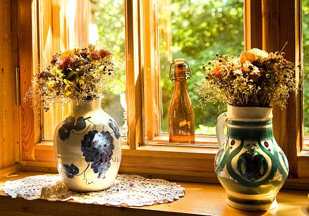 istock Bouquets of wild flowers in a ceramic jugs 622784994