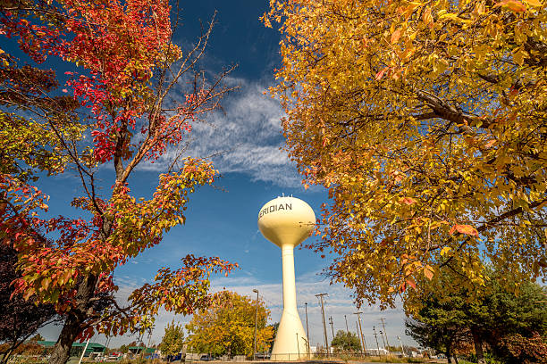 istock Fall colors souround yellow Meridian water tower 622785072