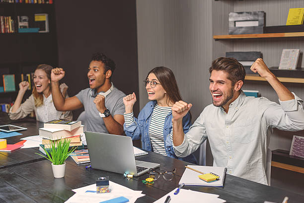 istock College students sitting together and studying 622790954