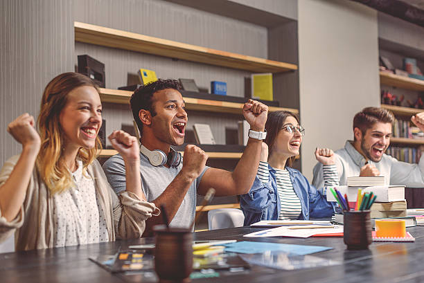 istock College students sitting together and studying 622791112