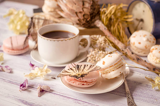 istock Cup of coffee with macaroons, dried flowers protea 622794238
