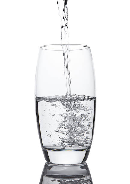 istock Pouring cold fresh healthy still water to glass 622797538