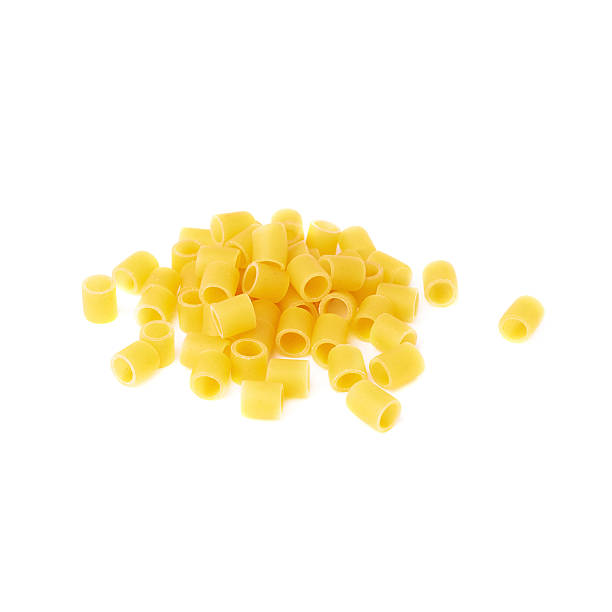 istock Pile of dry ditalini pasta over isolated white background 622798596