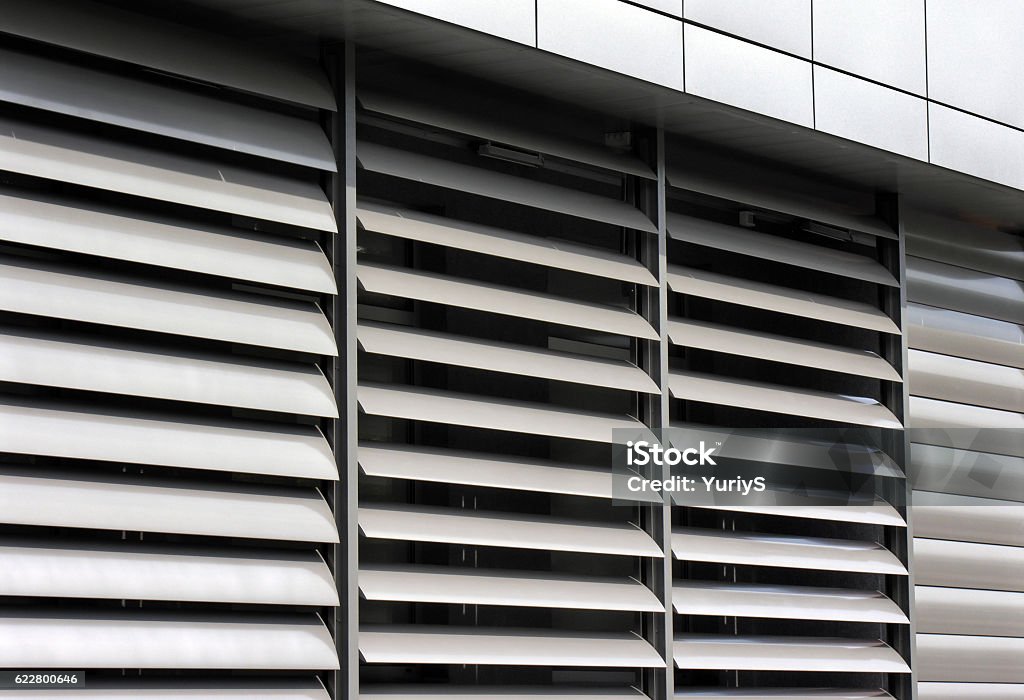 metallic  window shutter at the  office building metallic   window shutter at the  office building, innovation technique Aluminum Stock Photo