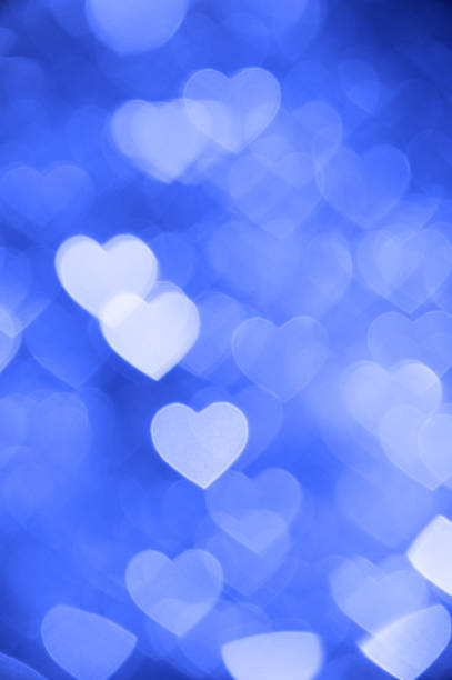 istock blue heart bokeh background photo, abstract holiday backdrop 622801756