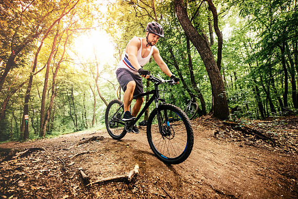 istock Professional mountain bike cyclist riding trail in forest 622802206