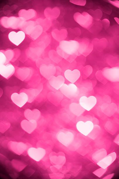 istock pink heart bokeh background photo, abstract holiday backdrop 622802636