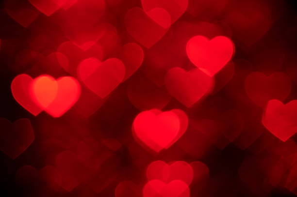 istock light red heart bokeh background photo, abstract holiday backdrop 622802752