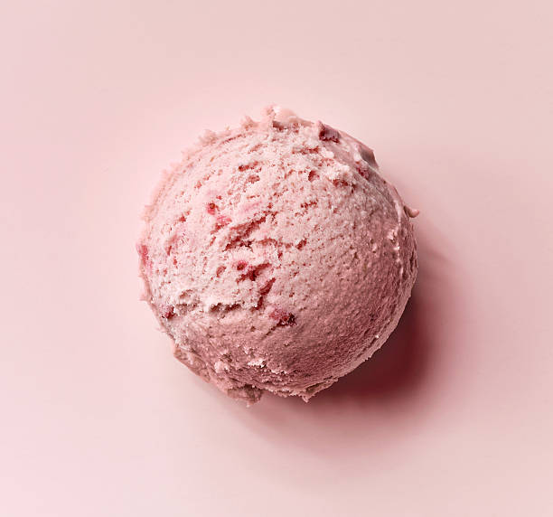 pink ice cream ball strawberry ice cream ball on pink background, top view scoop shape photos stock pictures, royalty-free photos & images