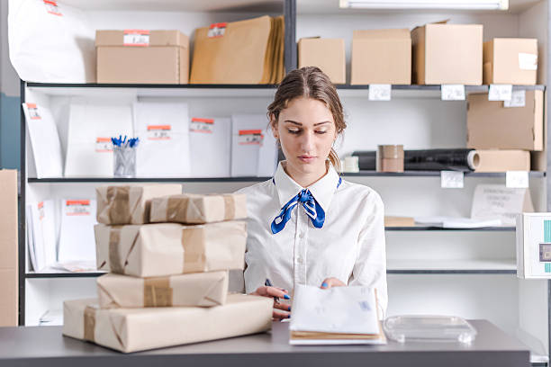 istock woman working at the post office 622805122