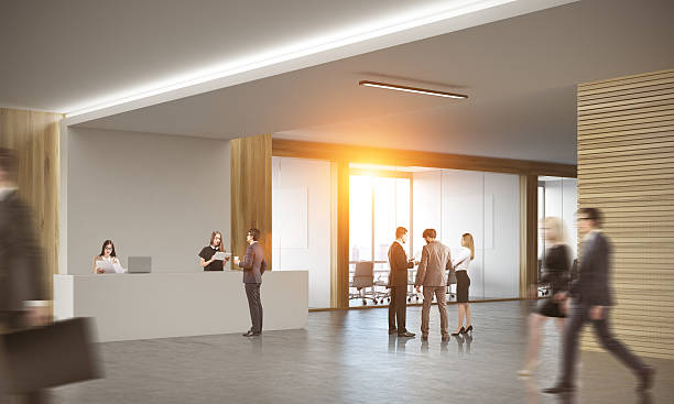 istock Business people in office with two receptionists 622805524