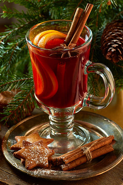 istock Mulled wine with cinnamon sticks,  ginger cookies and spruce branches 622805818