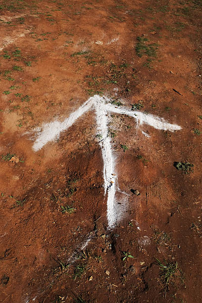 istock Directional Arrow marked on a barred ground 622806936
