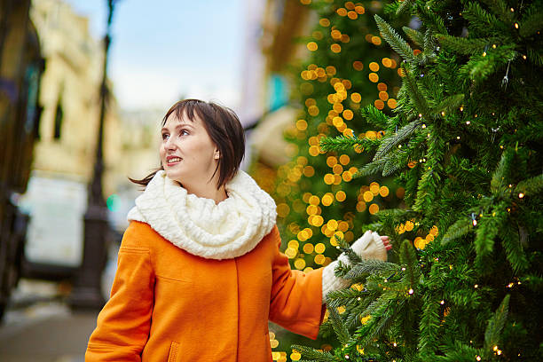 istock Cheerful young woman in Paris at Christmas 622809018