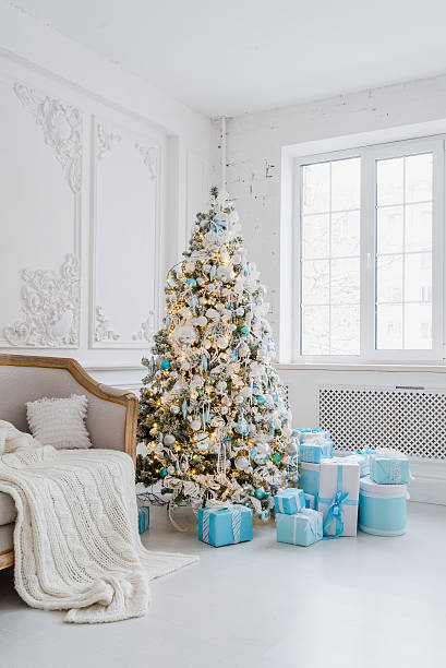 istock Christmas tree decoration at home interior with blue gift boxes 622809174