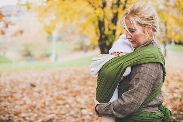 istock Newborn sleeping in baby carrier 622809188