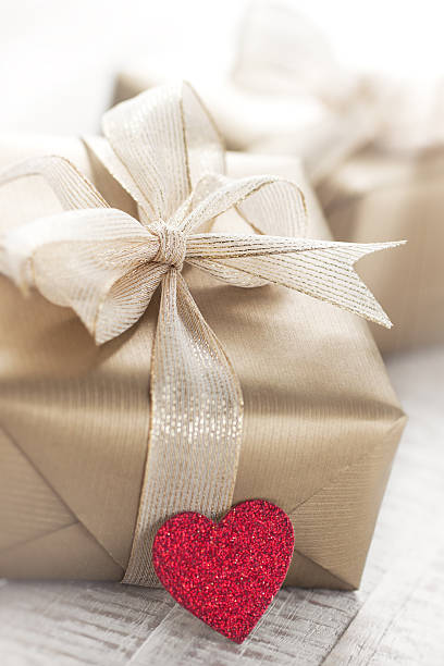 istock Golden gift boxes with beautiful ribbon and bow 622810420