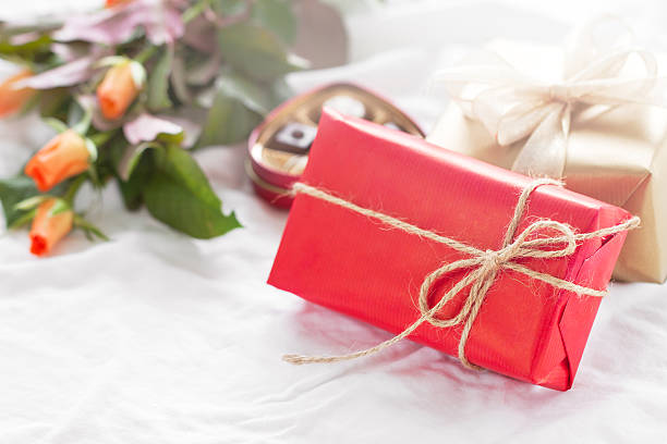istock Beautiful colourful pretty gift or present in a natural paper 622811296