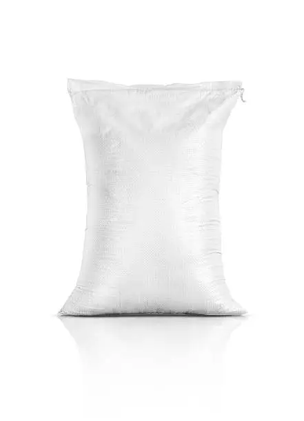 Photo of rice sack, agriculture product isolated on white