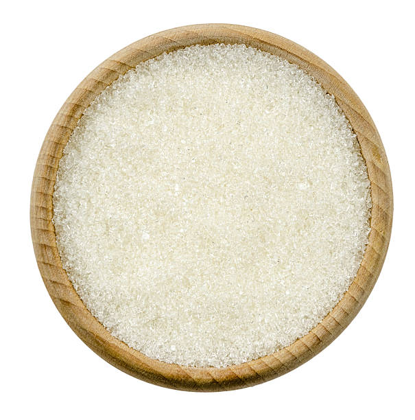 istock White granulated sugar in bowl isolated 622888768