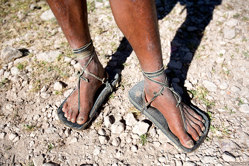 Young man's feet with traditional Tarahumara tribal primative sandals