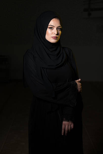 istock Attractive Muslim Woman On Black Background 622891318