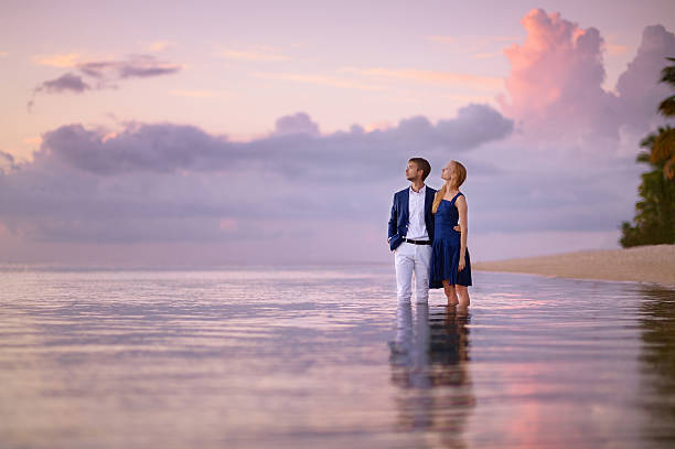 istock Beautiful romantic couple on a tropical beach 622892344