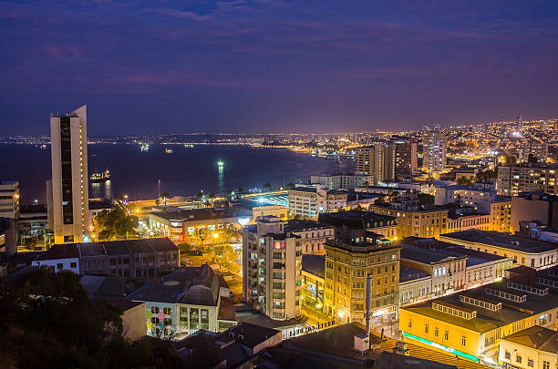 Beatiful night aerial view of Valparaiso in Chile Night aerial view of Valparaiso in Chile. Evening cityscape of Valparaiso, Chile valparaiso chile stock pictures, royalty-free photos & images
