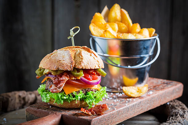 istock Fresh burger with onion, tomato and lettuce 622898558