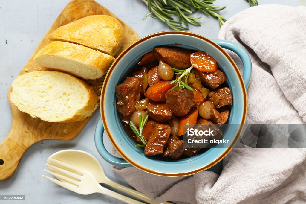 Traditional  beef goulash - Boeuf bourguigno.Stew meat with vegetables Traditional  beef goulash - Boeuf bourguigno. Comfort food. Stew meat with vegetables Beef Stew Stock Photo