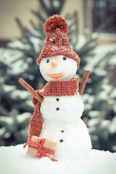 istock Vintage photo, Snowman with gift for Christmas 622906140