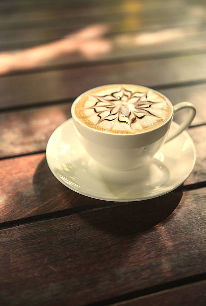 istock Coffee cappuccino on a wooden table . 622907966