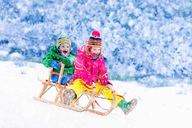istock Children toddler having fun on sleigh ride 622908596