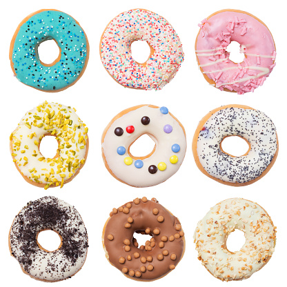 Set of nine assorted donuts isolated on white background