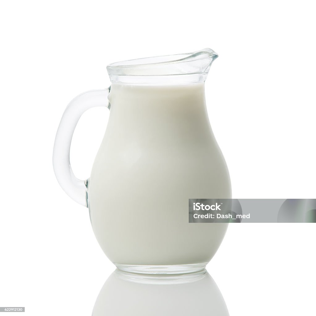 Glass jug of fresh milk isolated on white background Glass jug full of fresh milk isolated on white background Milk Stock Photo