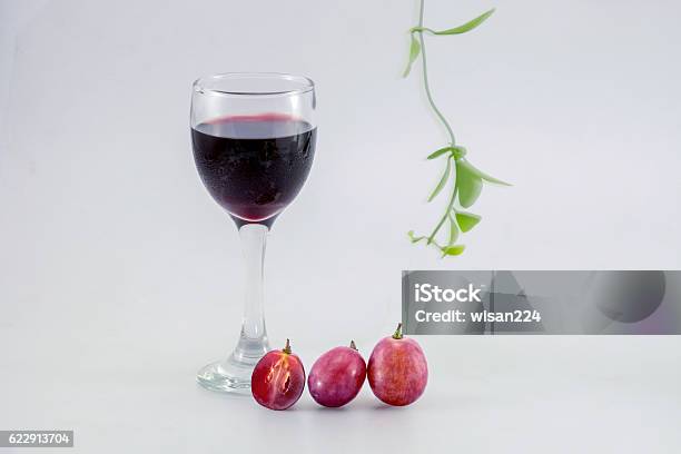Glass Of Wine And Grapes Isolated On White Stock Photo - Download Image Now - Agriculture, Alcohol - Drink, Alcohol Abuse
