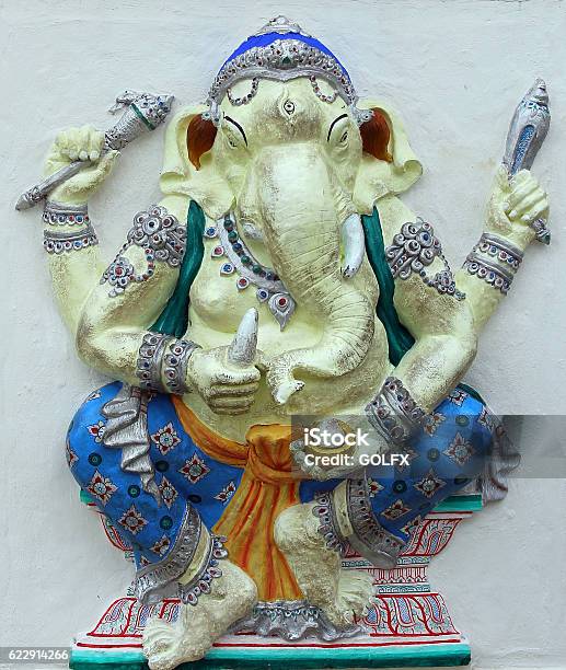 Sitting White Ganesha Blue Dresses On White Wall Stock Photo - Download  Image Now - Elephant, Bas Relief, Beginnings - iStock