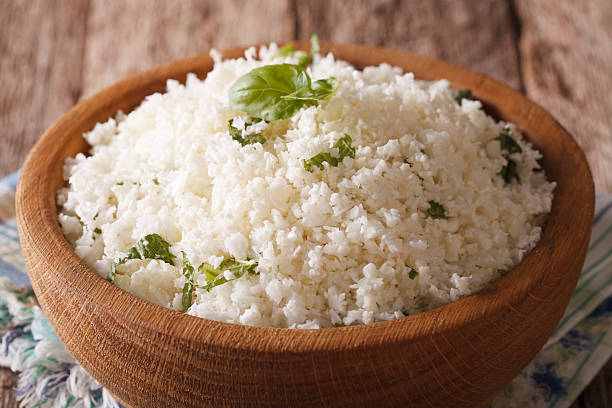 istock Paleo Food: Cauliflower rice with herbs close-up. horizontal 622916628
